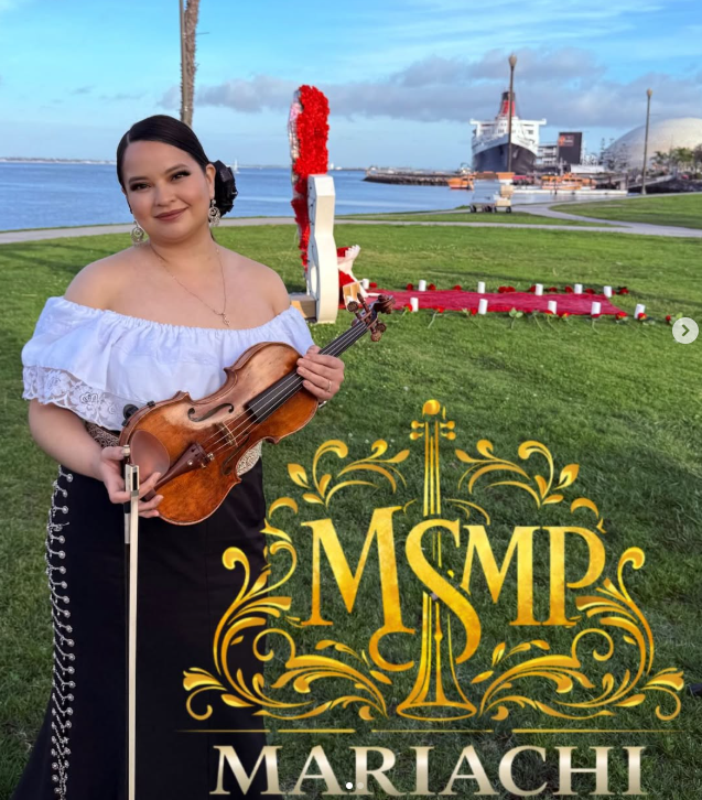Mariachi violinist performing outdoors in Long Beach