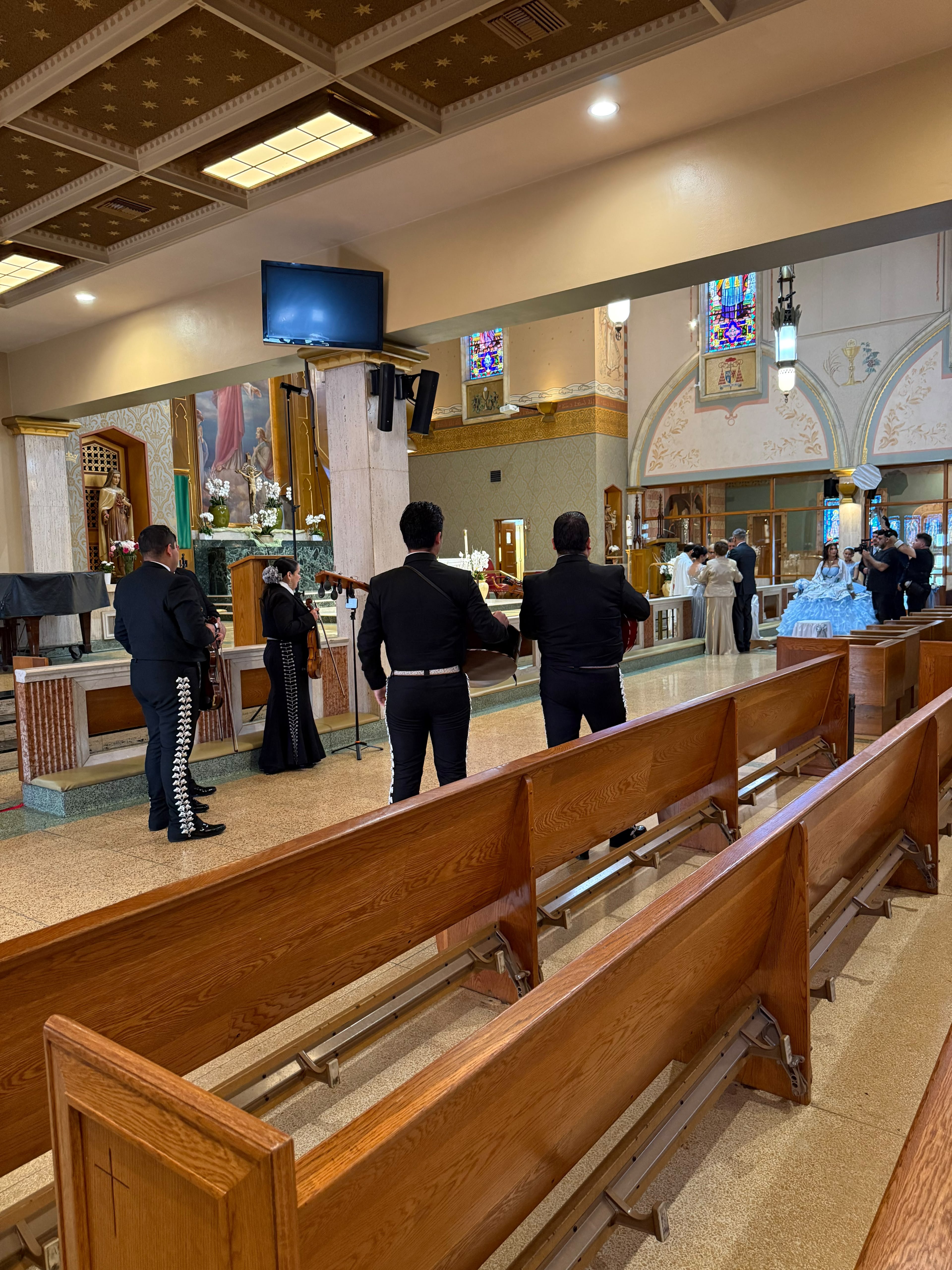 Mariachi performing at a church ceremony